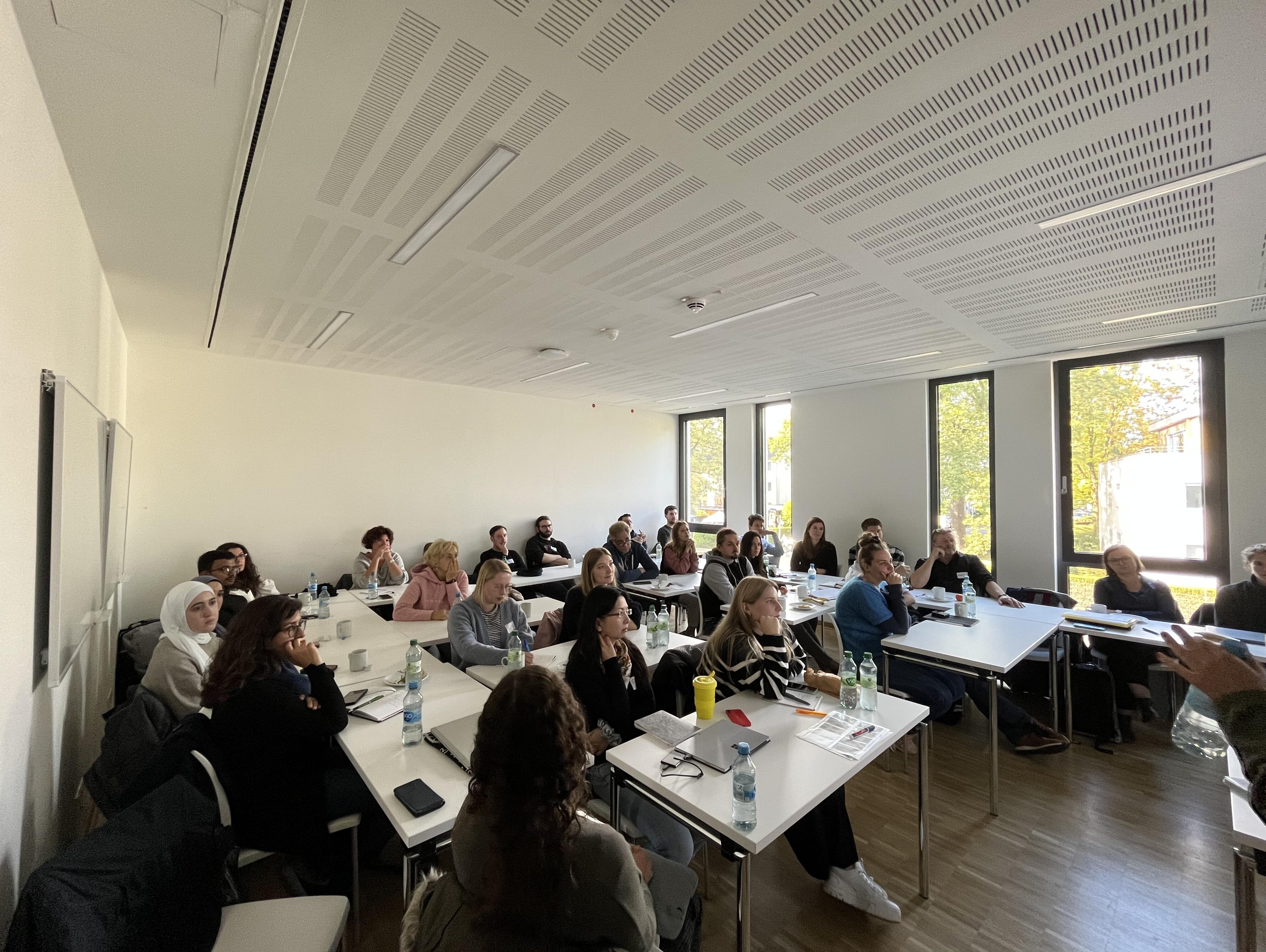 The participants are listening to the presentations carefully
