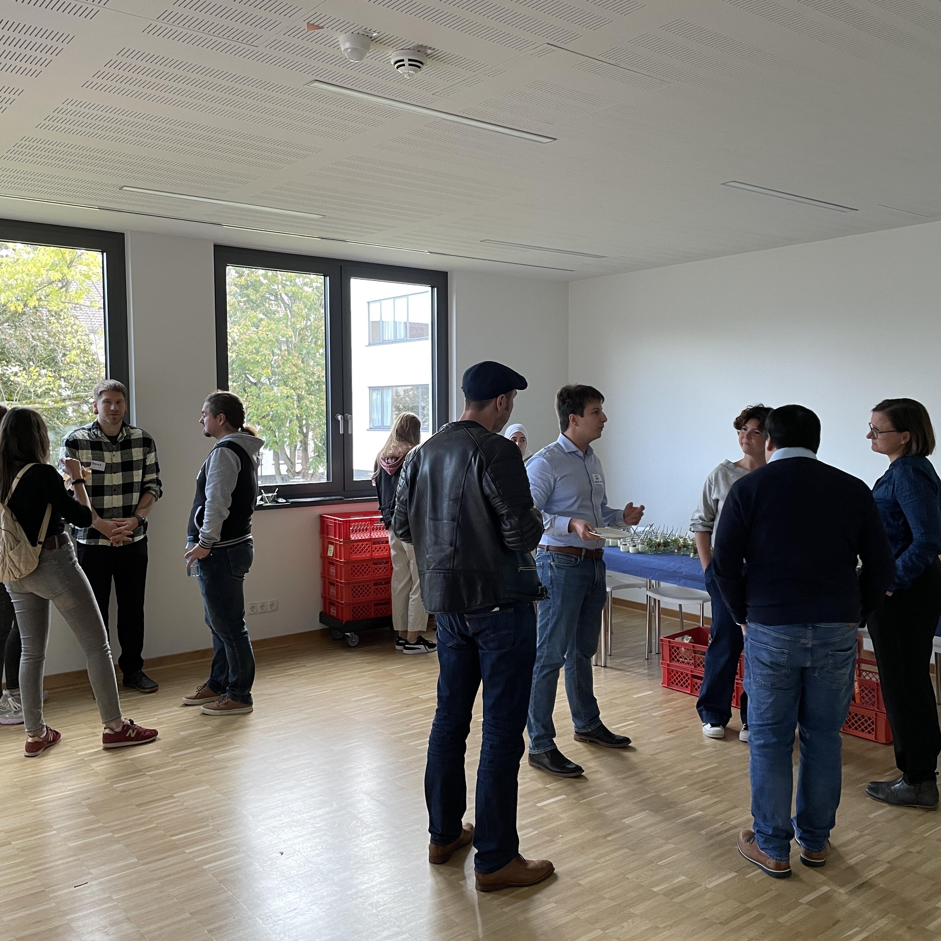 The participants are exchanging views during lunch buffet.